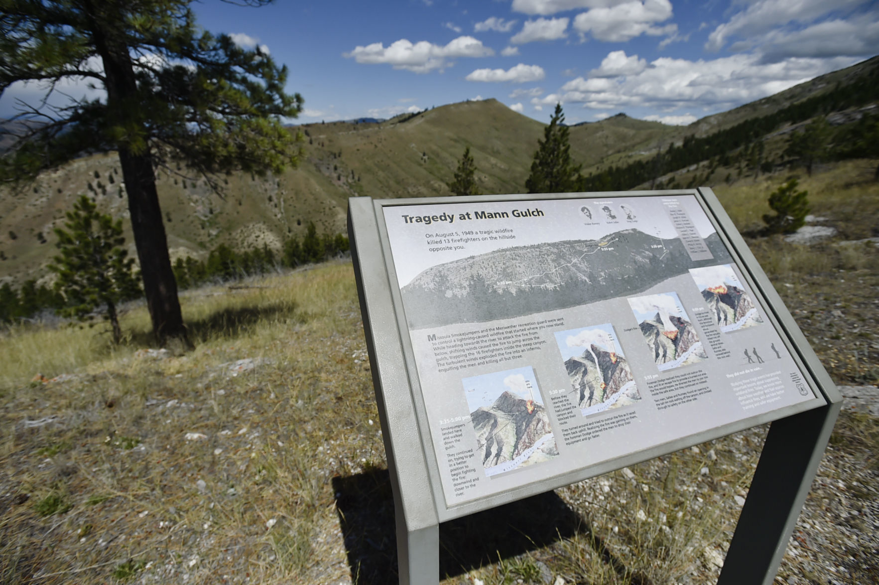 A informational signs tells the story of the Mann Gulch tragedy